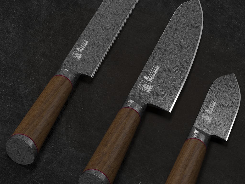 Set of beautifully crafted Damascus steel knives with wooden handles, perfect for professional chefs.
